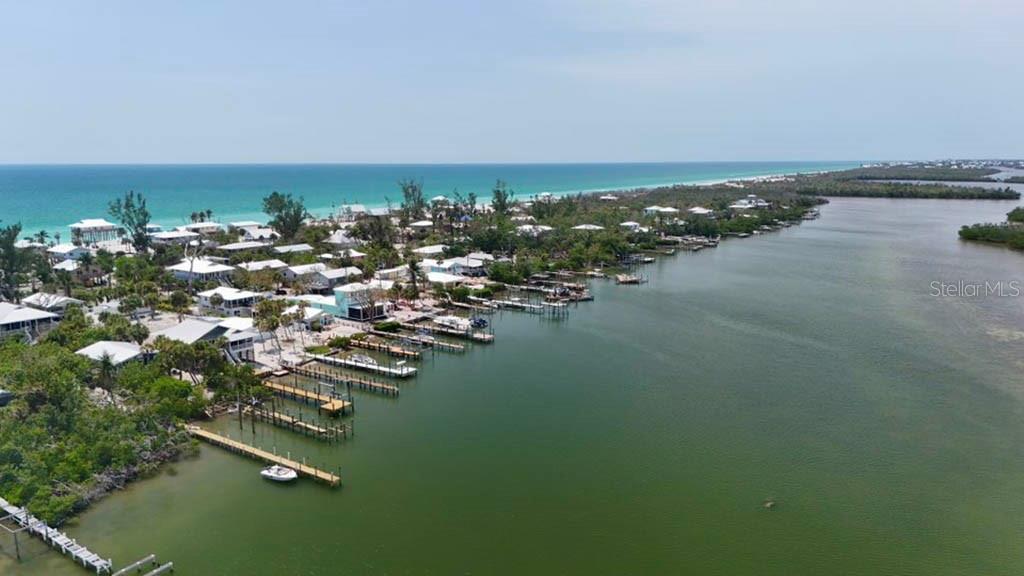 8156 Little Gasparilla Boca Grande, FL 33921 - Photo 9 of 25 an aerial view of a city with ocean view