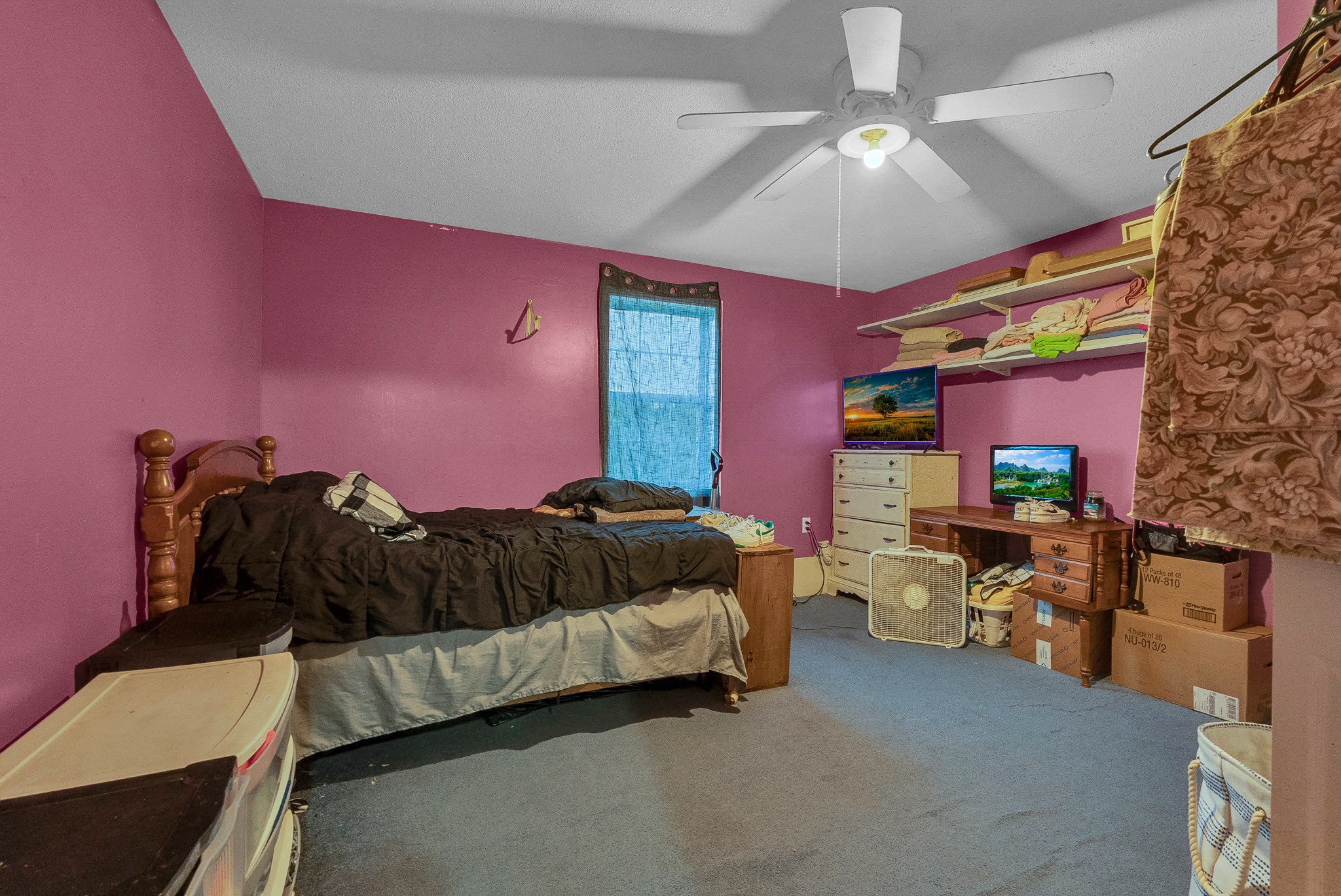 164 Glenn Lane Spring City, TN 37381 - Photo 15 of 33 a bedroom with a bed and a chandelier