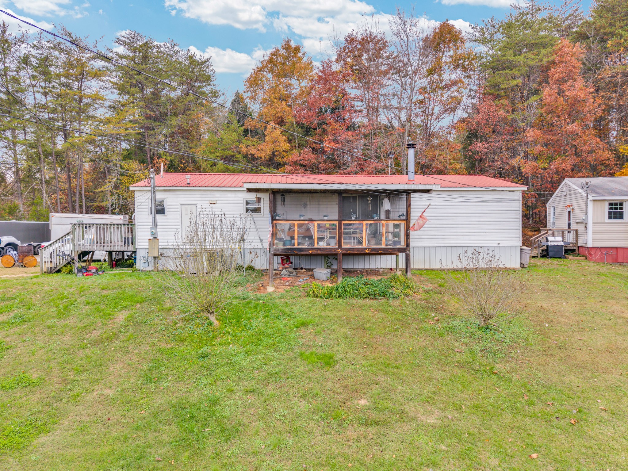 164 Glenn Lane Spring City, TN 37381 - Photo 31 of 33 a view of a house with a yard and sitting area