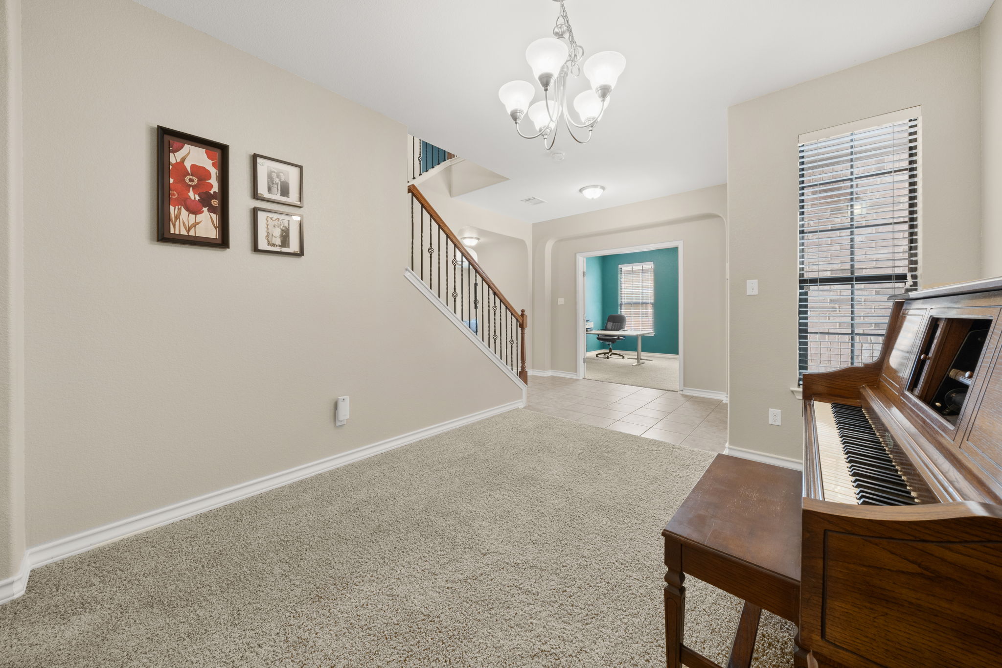 7629 Brecourt Manor Way Austin, TX 78739 - Photo 13 of 40 a view of a livingroom with furniture and a window