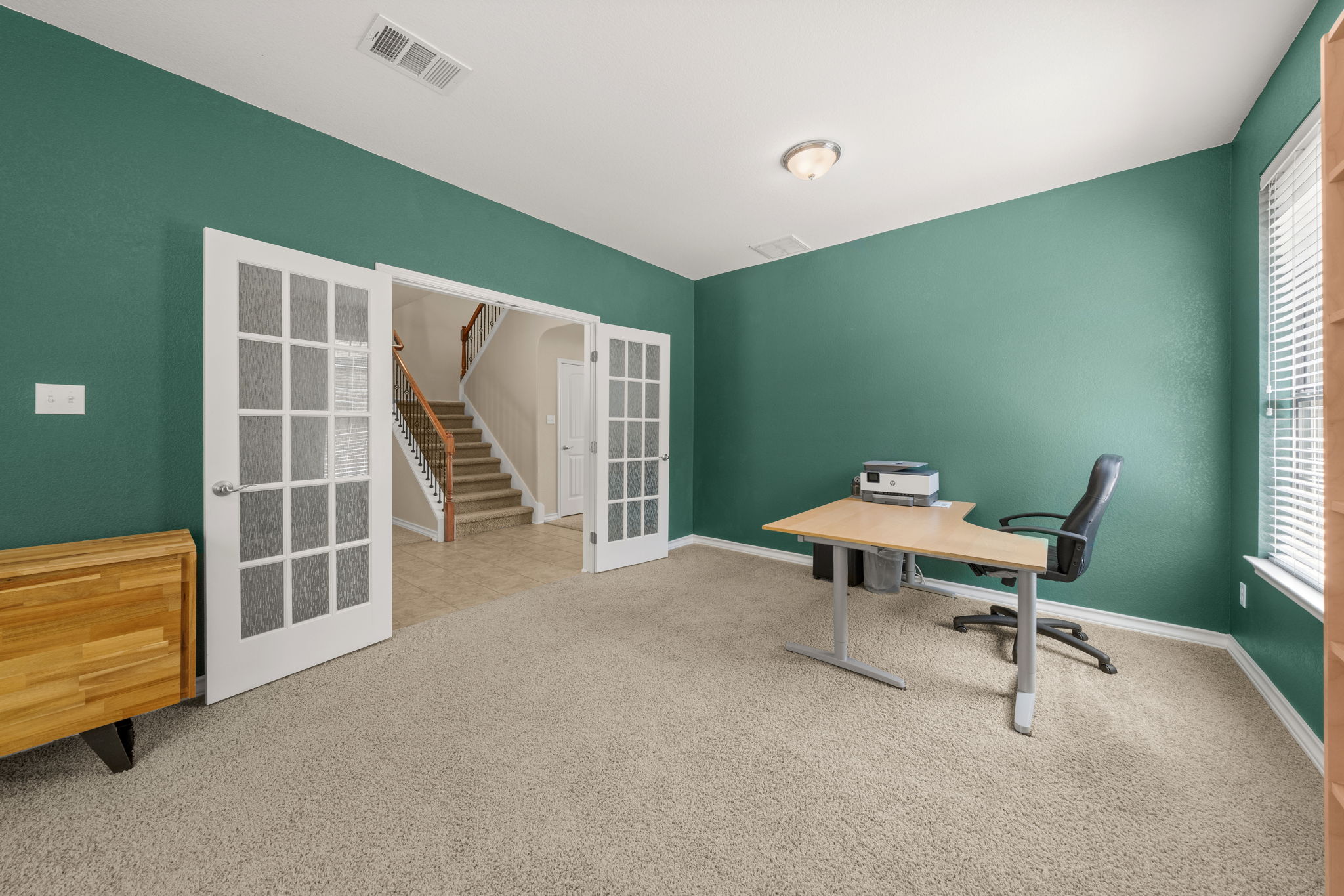 7629 Brecourt Manor Way Austin, TX 78739 - Photo 15 of 40 a workspace with furniture and window
