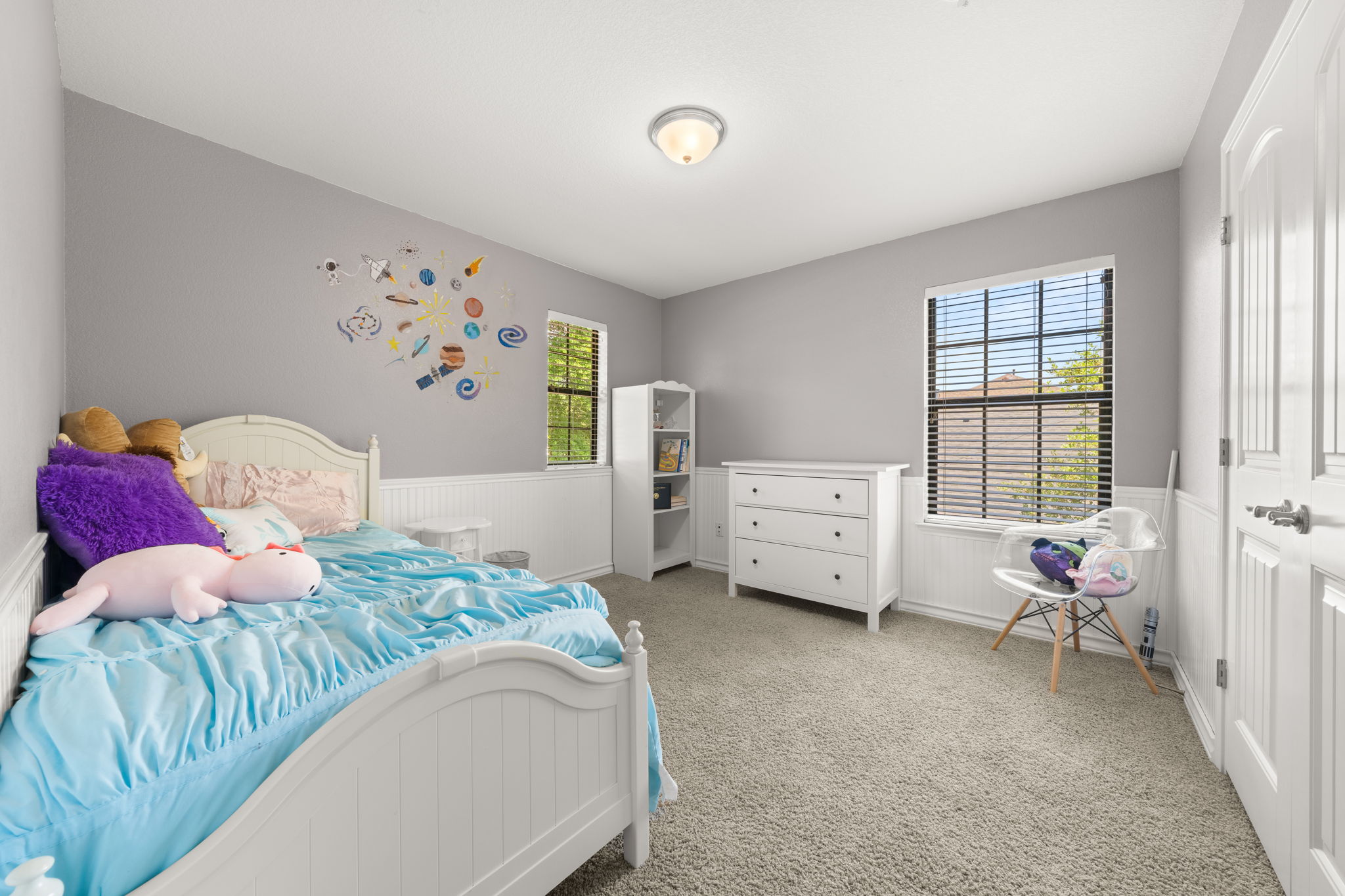 7629 Brecourt Manor Way Austin, TX 78739 - Photo 26 of 40 a bedroom with a bed and a window