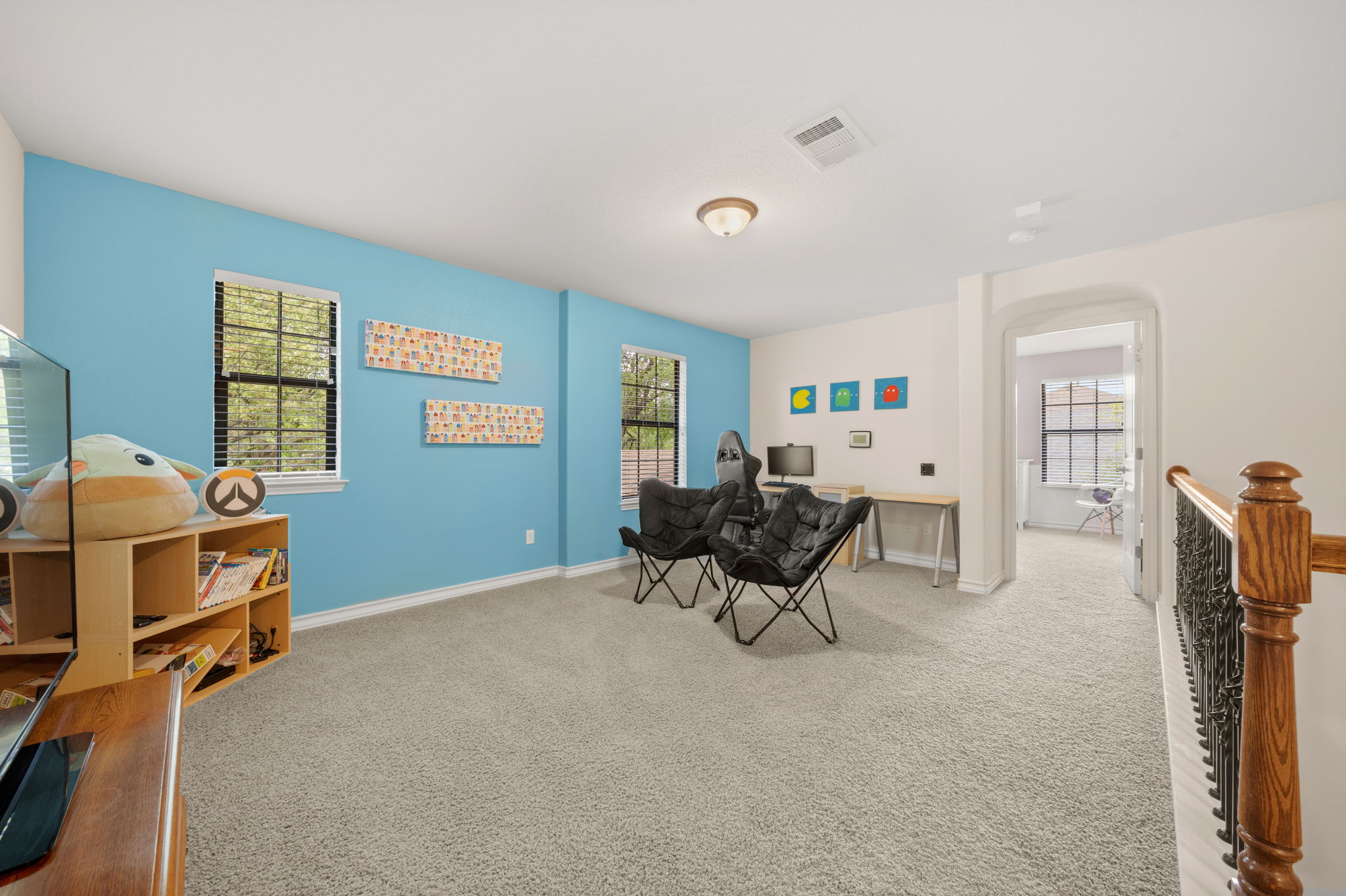 7629 Brecourt Manor Way Austin, TX 78739 - Photo 29 of 40 a bedroom with furniture and a window