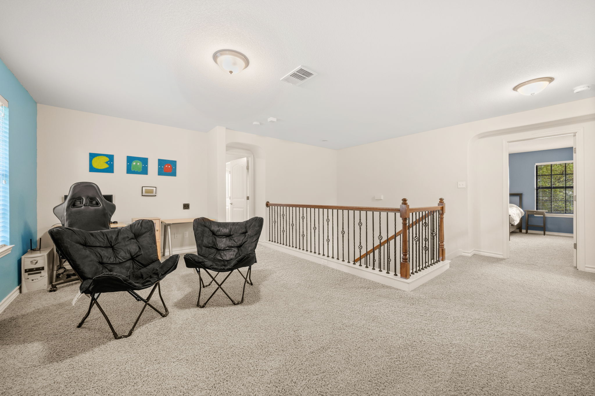7629 Brecourt Manor Way Austin, TX 78739 - Photo 31 of 40 a living room with furniture and a window