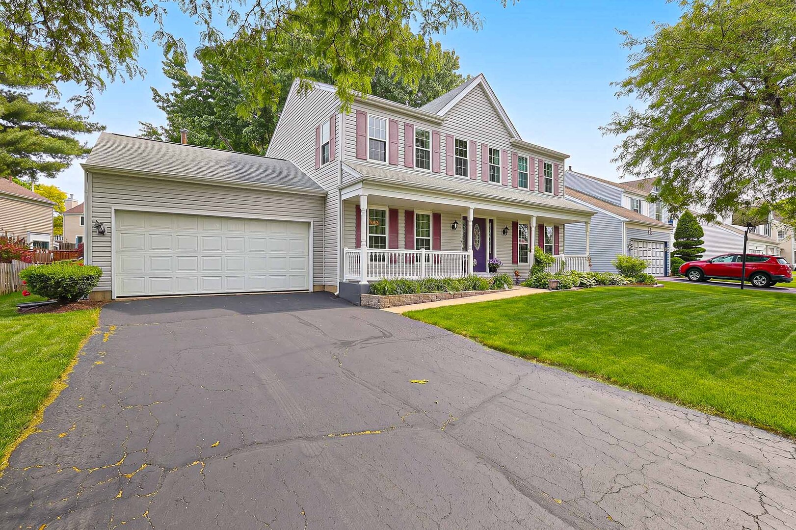 830 Hawk Lane Carol Stream, IL 60188 - Photo 2 of 30 a front view of house with yard and green space