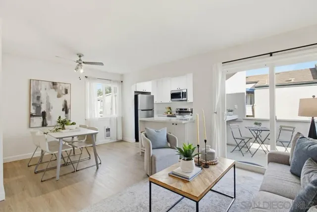 a living room with furniture and a table