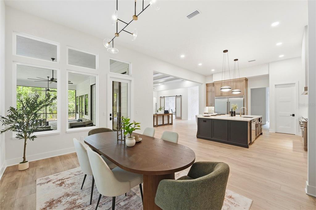 5995 Southwest 124th Way Archer, FL 32618 - Photo 13 of 33 a living room with furniture kitchen and a table