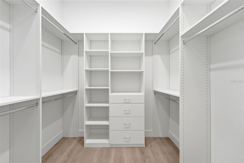 5995 Southwest 124th Way Archer, FL 32618 - Photo 19 of 33 a view of walk in closet with empty racks