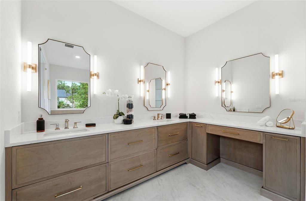 5995 Southwest 124th Way Archer, FL 32618 - Photo 21 of 33 a bathroom with a double vanity sink mirror and bathtub