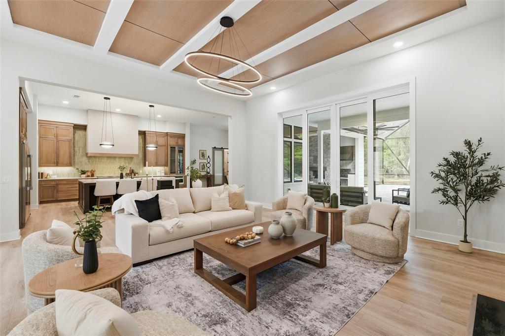 5995 Southwest 124th Way Archer, FL 32618 - Photo 5 of 33 a living room with furniture and a large window