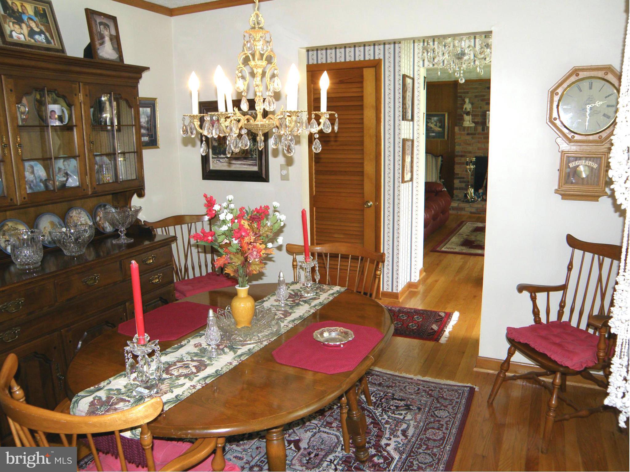 5904 Medora Road Linthicum Heights, MD 21090 - Photo 11 of 20 a view of a dining room with furniture