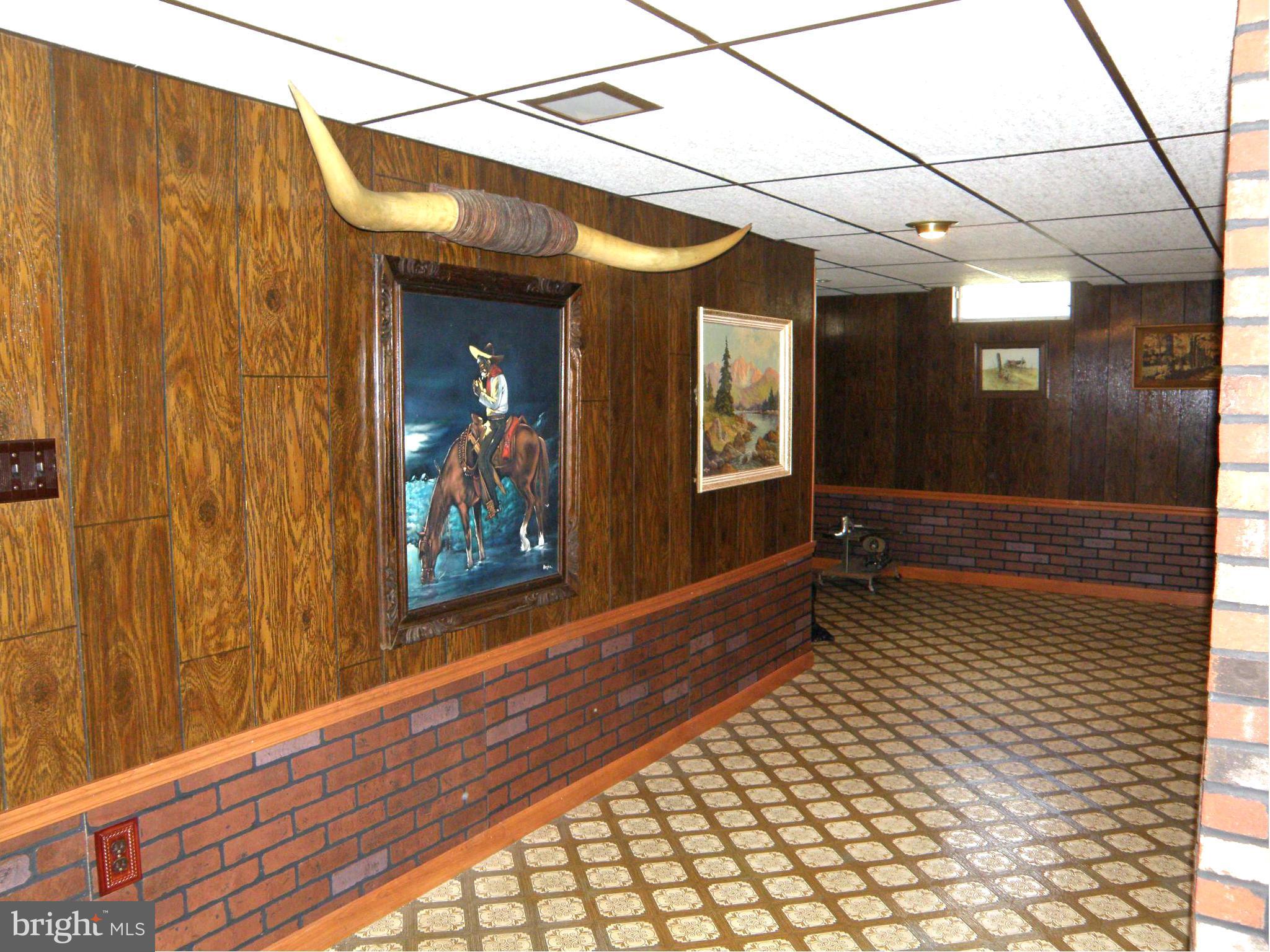 5904 Medora Road Linthicum Heights, MD 21090 - Photo 14 of 20 a view of a room with wooden walls