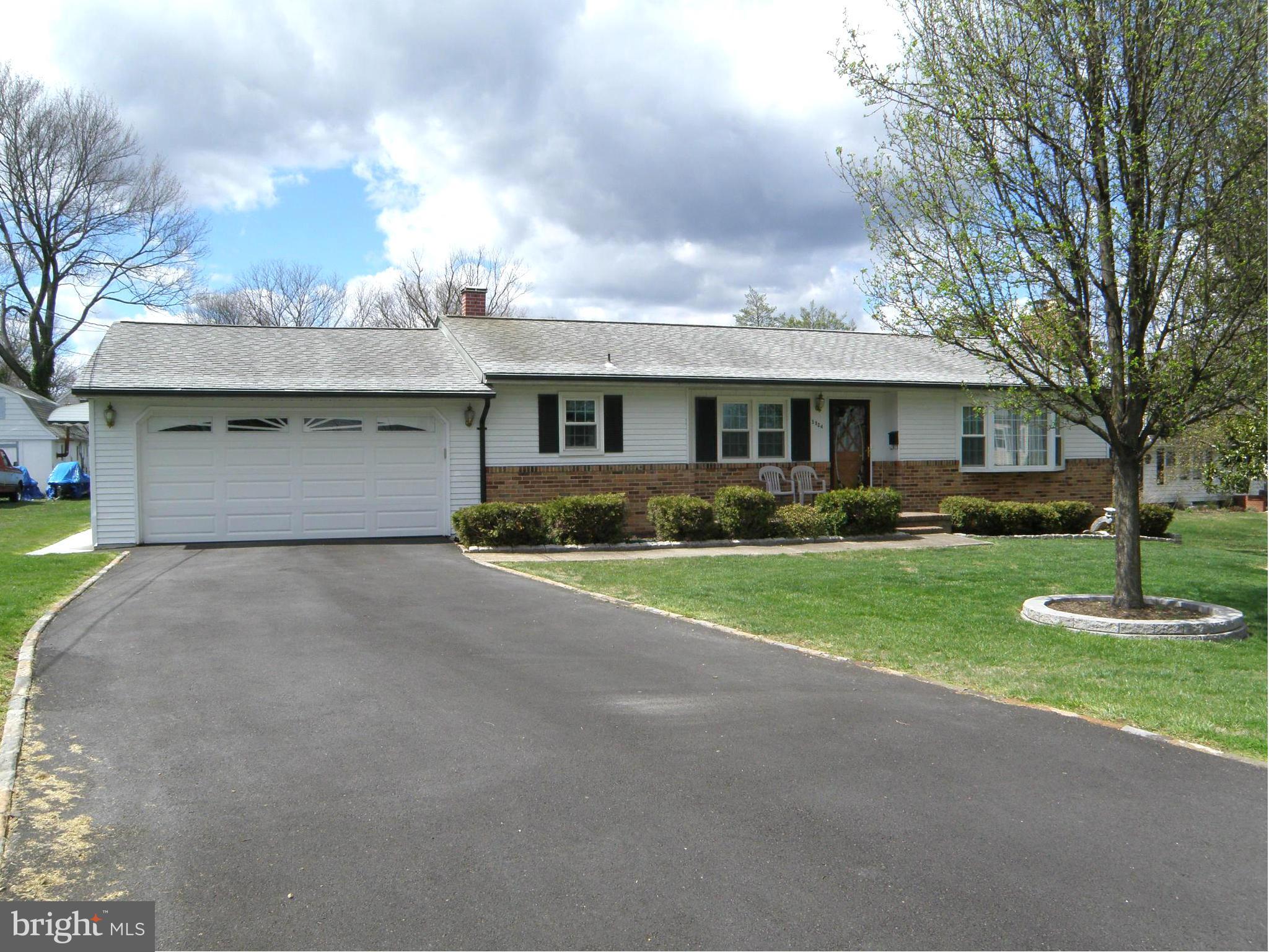 5904 Medora Road Linthicum Heights, MD 21090 - Photo 3 of 20 a front view of house with yard and green space