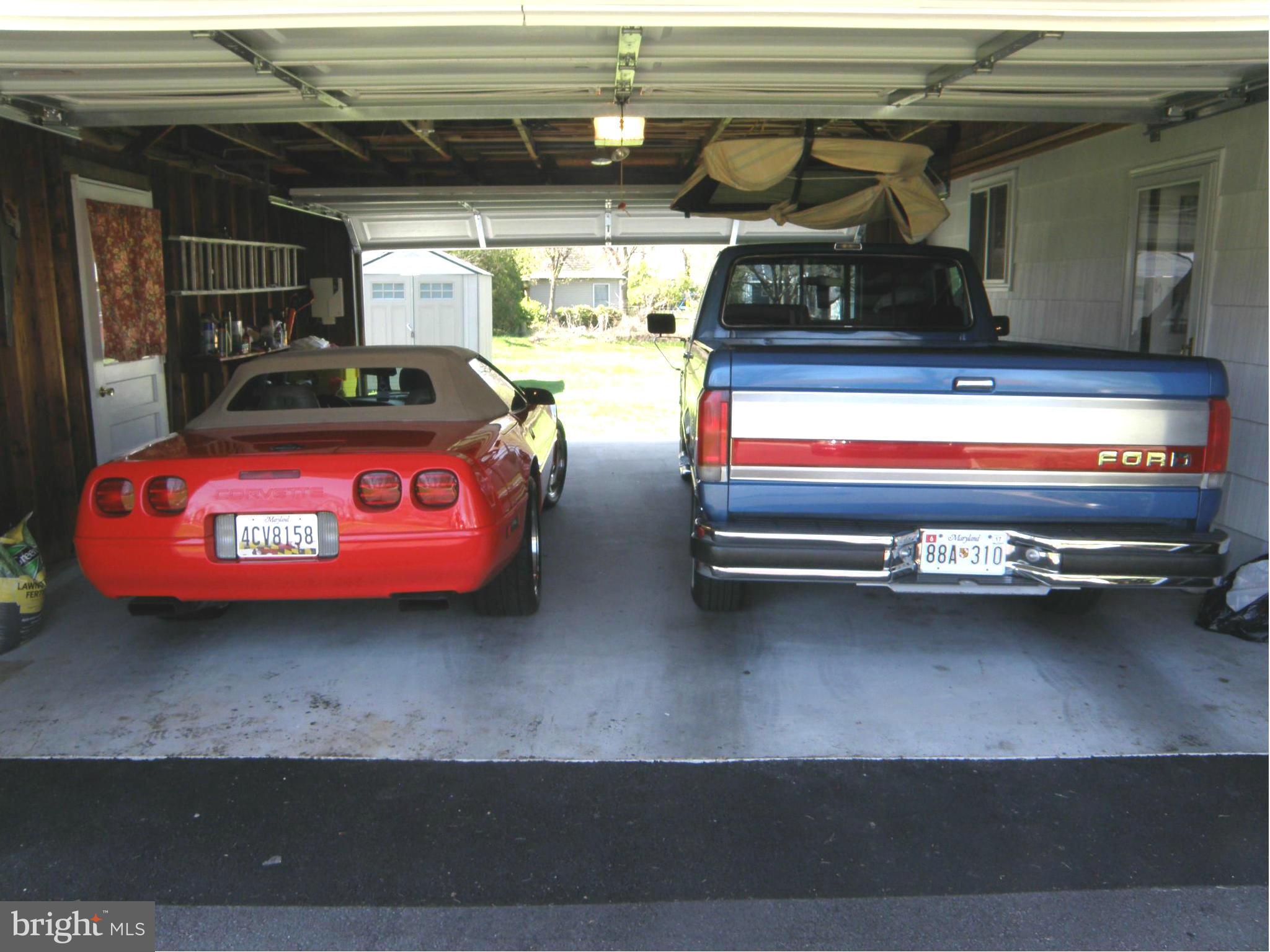 5904 Medora Road Linthicum Heights, MD 21090 - Photo 6 of 20 a car parked in parking room