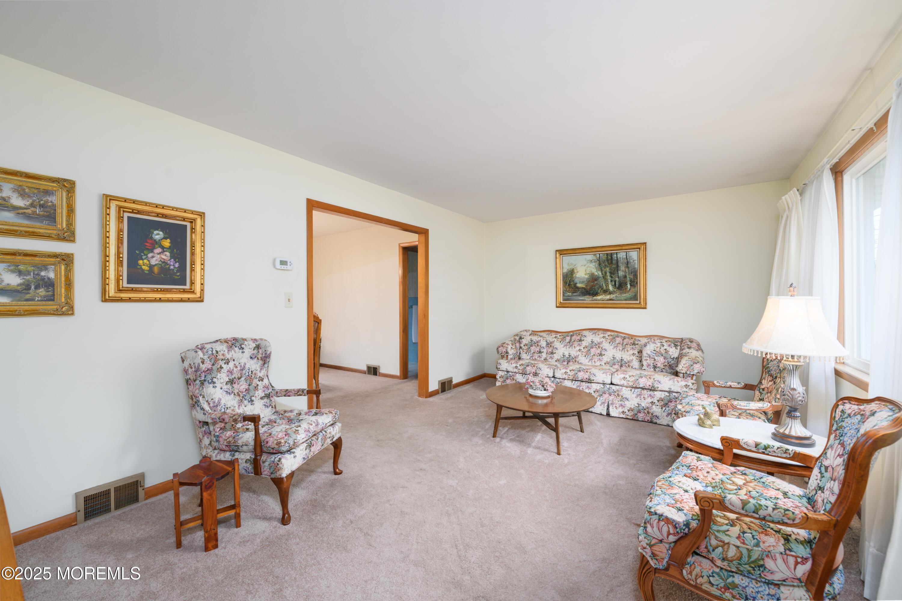 22 Overhill Road Matawan, NJ 07747 - Photo 14 of 27 a living room with furniture and a window