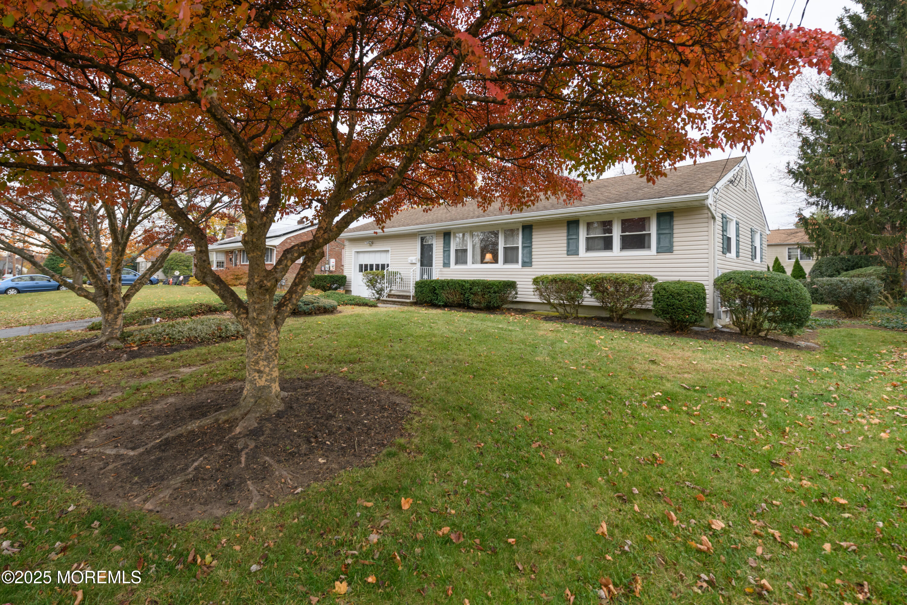 22 Overhill Road Matawan, NJ 07747 - Photo 2 of 27 a front view of a house with a yard