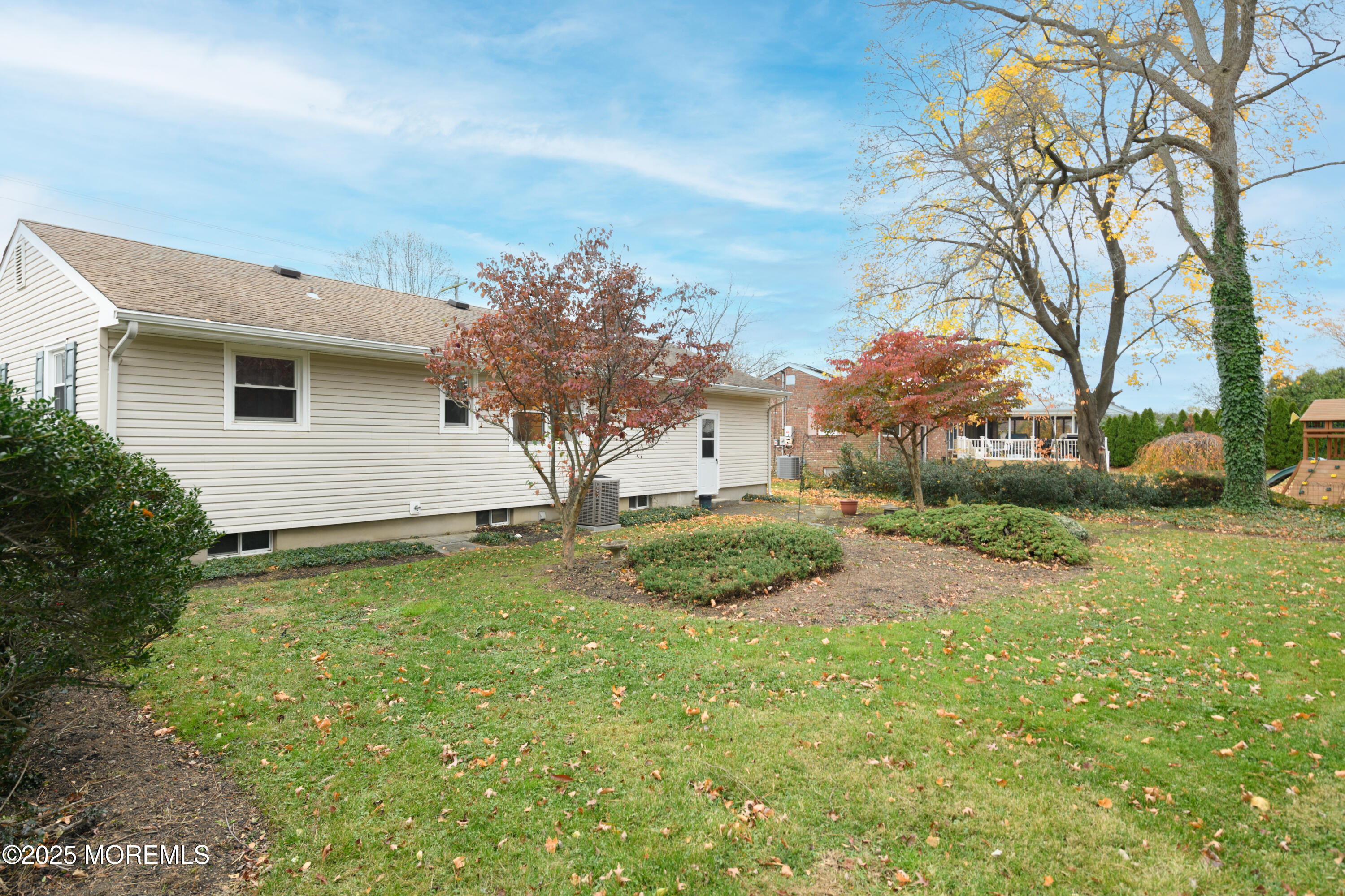 22 Overhill Road Matawan, NJ 07747 - Photo 26 of 27 a view of a backyard with large trees