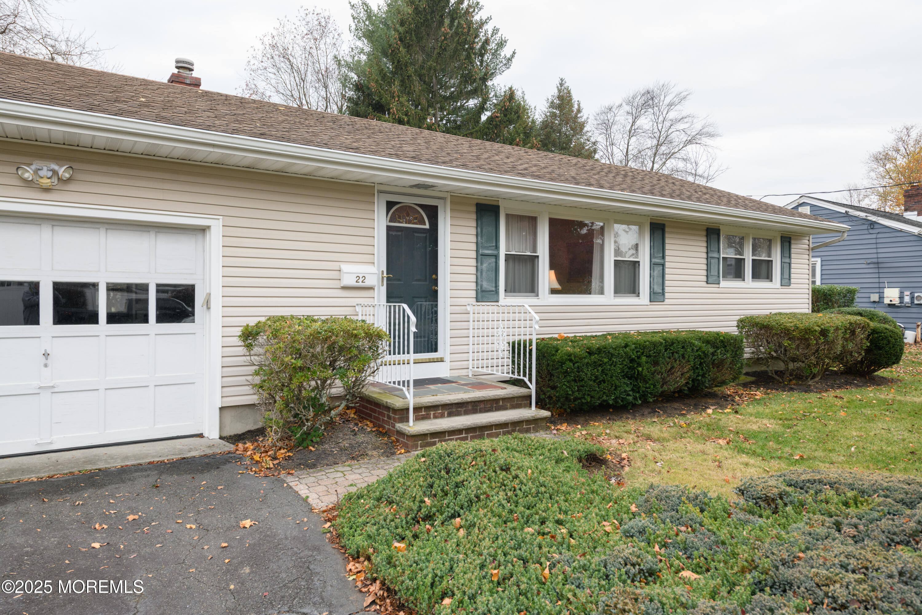 22 Overhill Road Matawan, NJ 07747 - Photo 27 of 27 a front view of a house with a yard