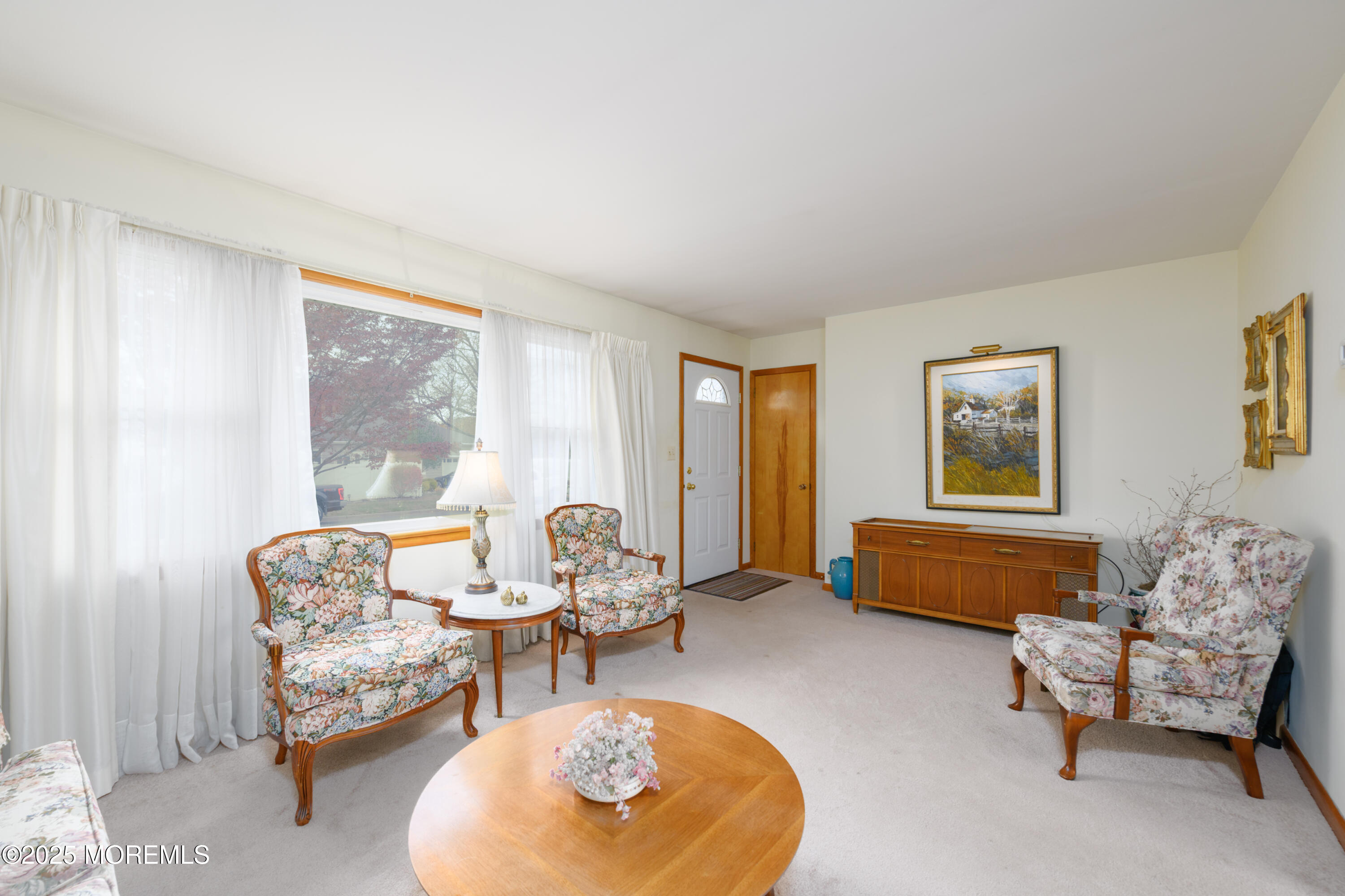 22 Overhill Road Matawan, NJ 07747 - Photo 6 of 27 a living room with furniture and a window