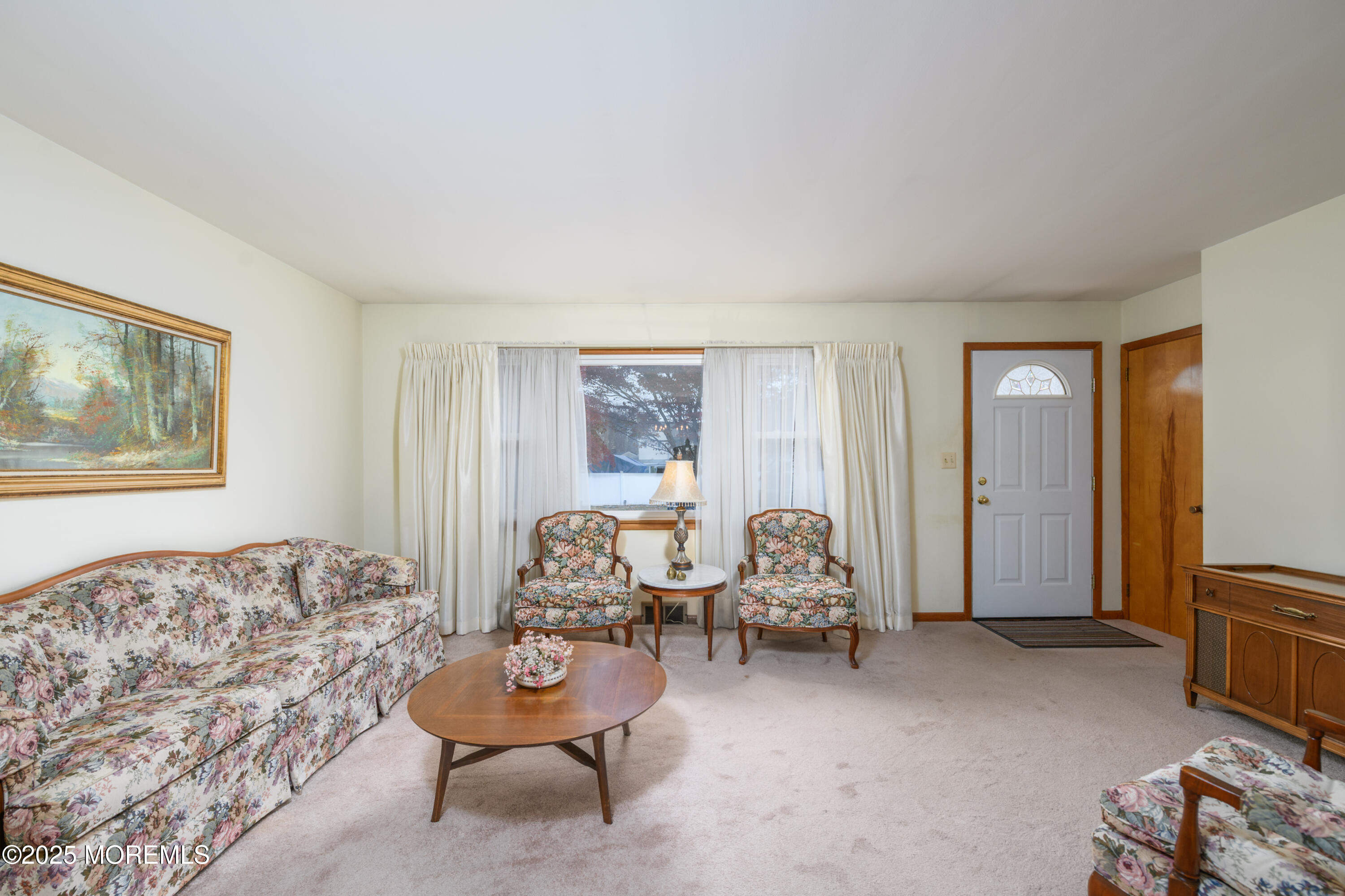 22 Overhill Road Matawan, NJ 07747 - Photo 7 of 27 a living room with furniture and a window