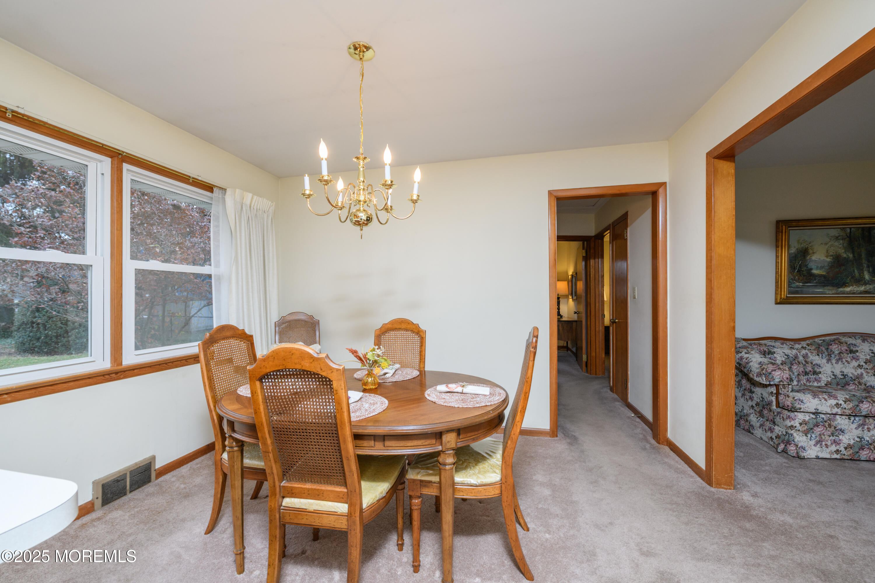 22 Overhill Road Matawan, NJ 07747 - Photo 9 of 27 a view of a dining room with furniture and chandelier