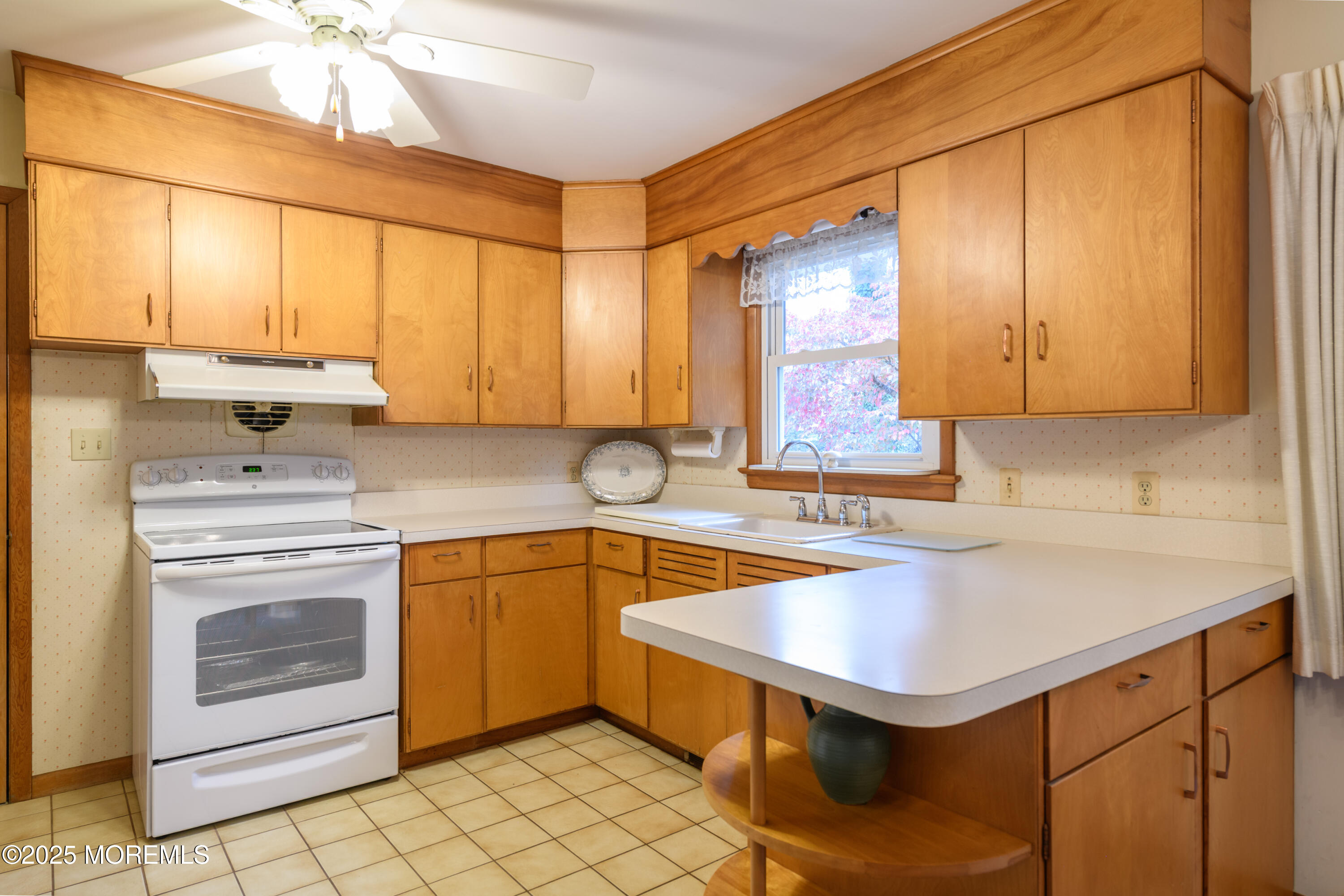 22 Overhill Road Matawan, NJ 07747 - Photo 10 of 27 a kitchen with a sink cabinets and window