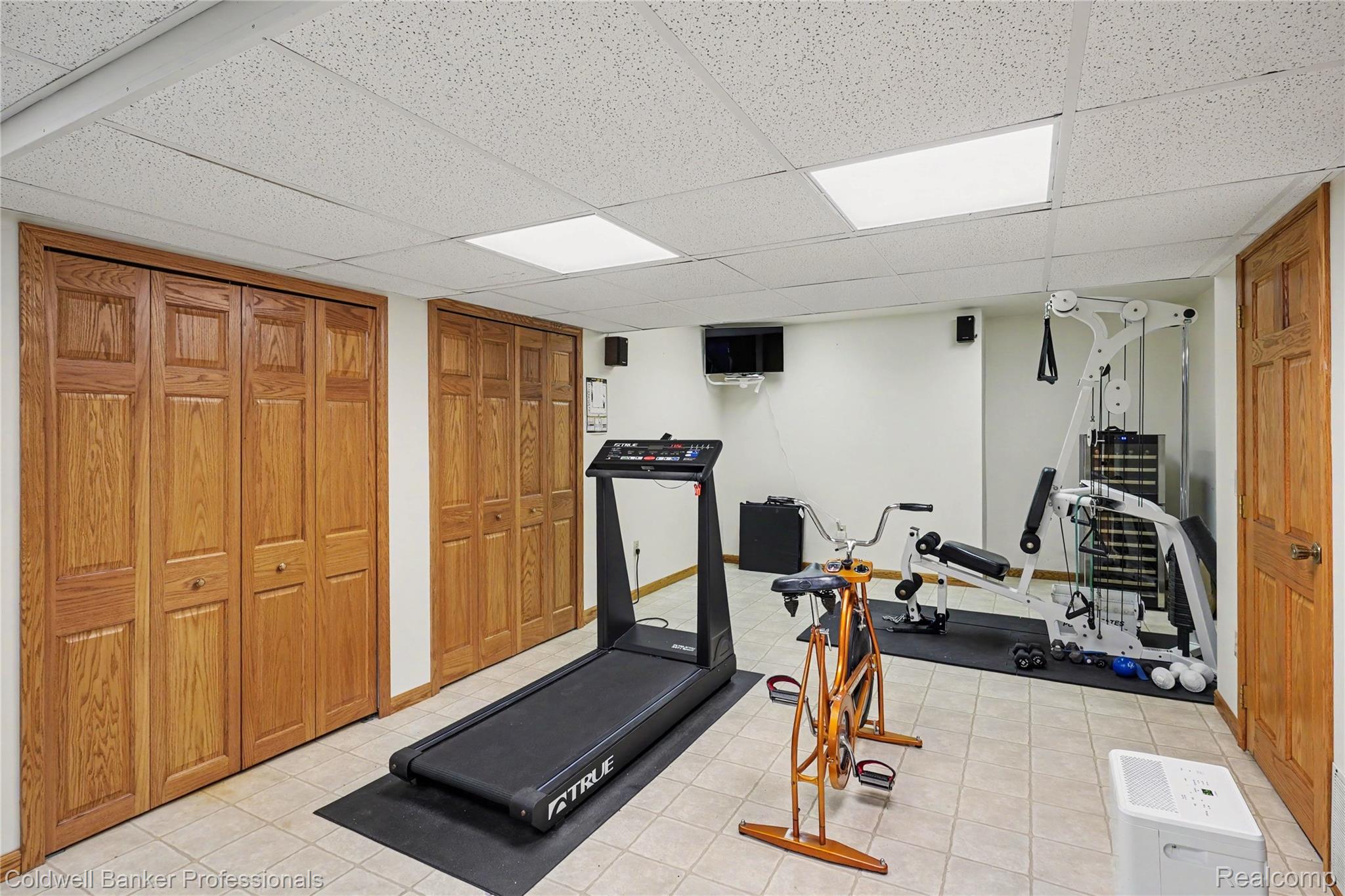 3583 Mitchell Road Metamora, MI 48455 - Photo 30 of 58 Finished lower level featuring light tile flooring and recessed lighting