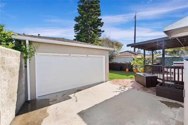 a view of a balcony with wooden floor and staircase