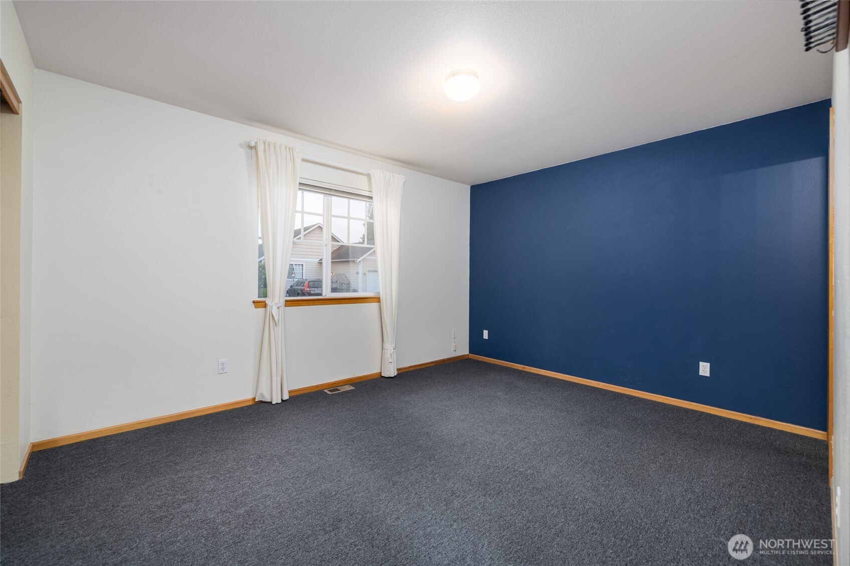 1154 Sinclair Way Burlington, WA 98233 - Photo 14 of 22 an empty room with entrance and windows