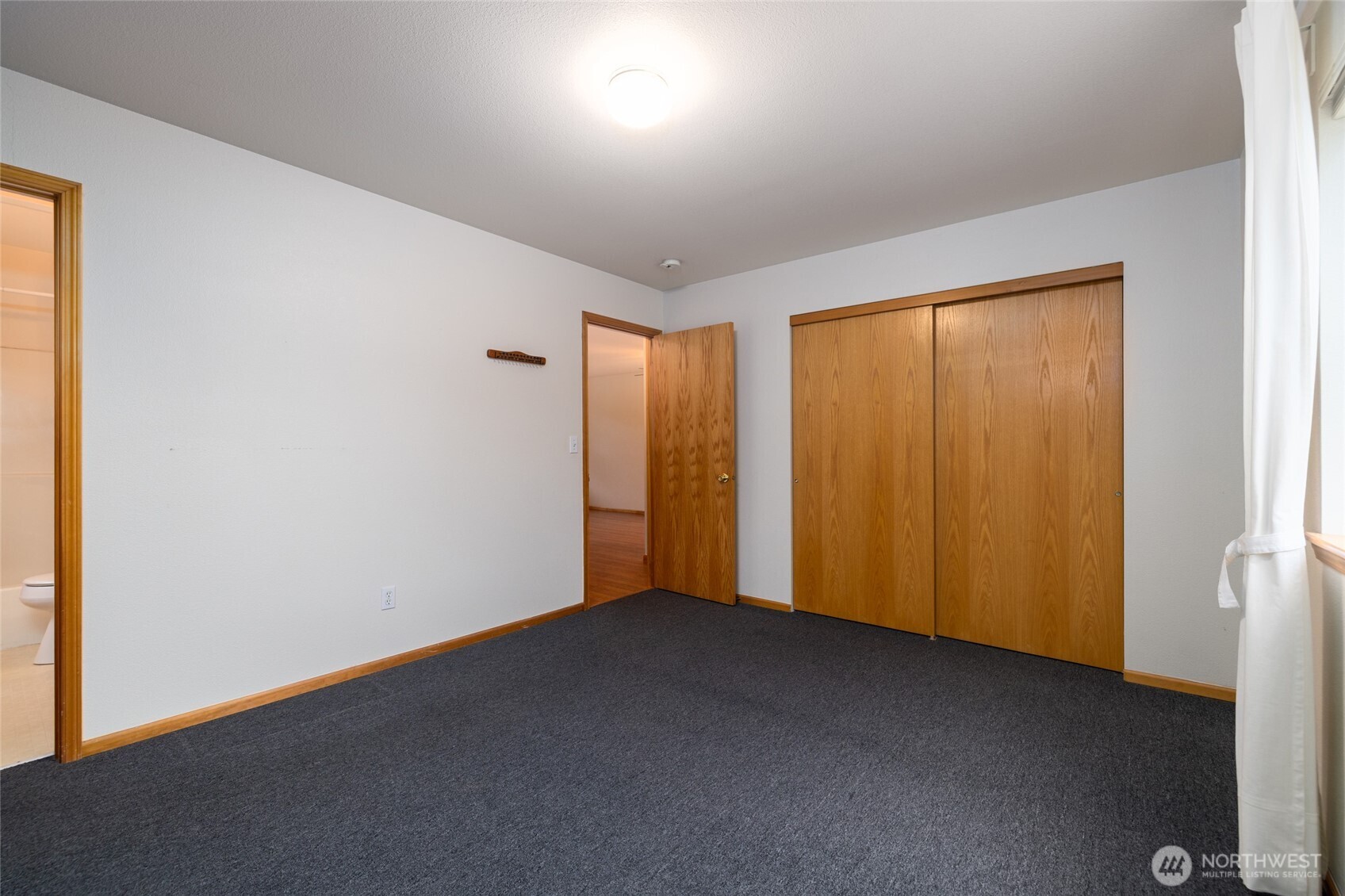 1154 Sinclair Way Burlington, WA 98233 - Photo 15 of 22 an empty room with windows