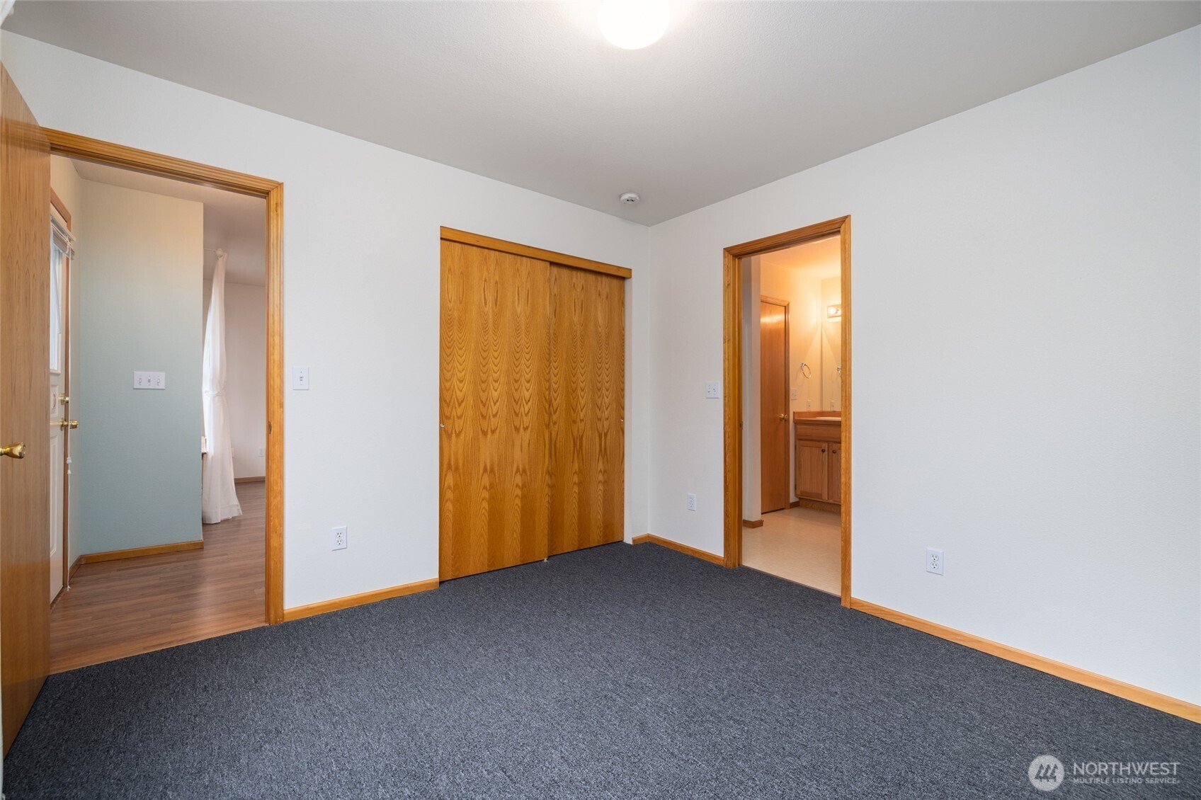 1154 Sinclair Way Burlington, WA 98233 - Photo 18 of 22 a view of an empty room with closet and a window