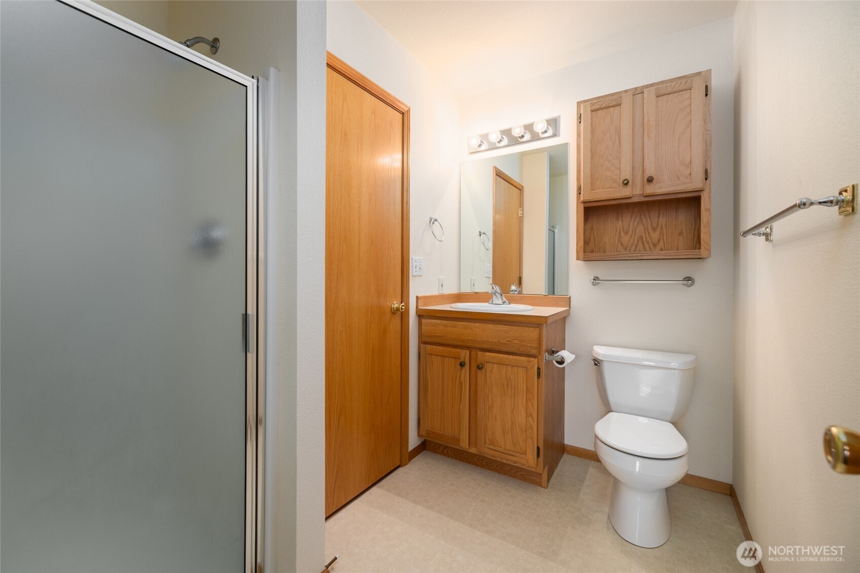 1154 Sinclair Way Burlington, WA 98233 - Photo 19 of 22 a bathroom with a toilet a sink and a mirror