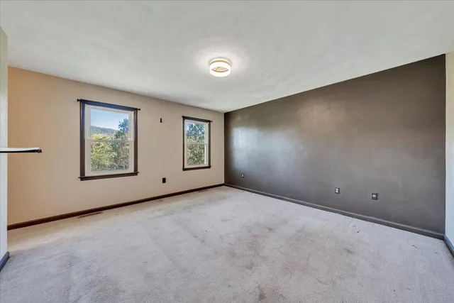 a bathroom with a shower and a tub