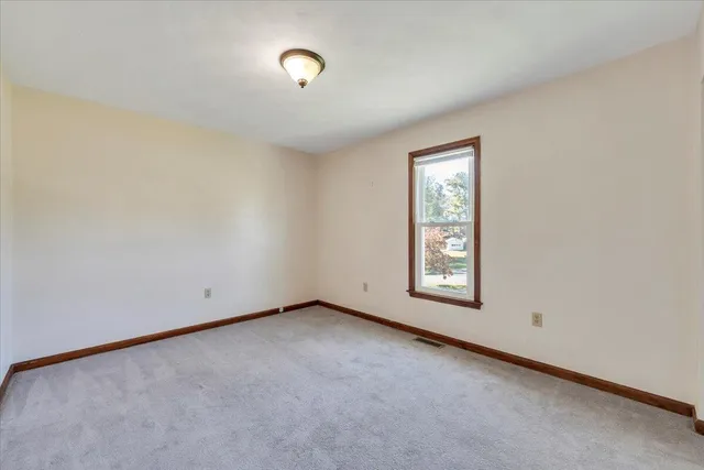 a view of a room with rack on the wall