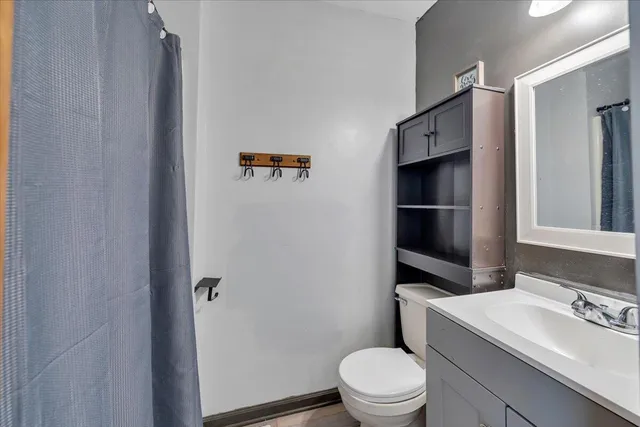 a view of a room with a walk in closet