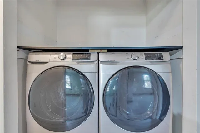 a view of a balcony with wooden floor