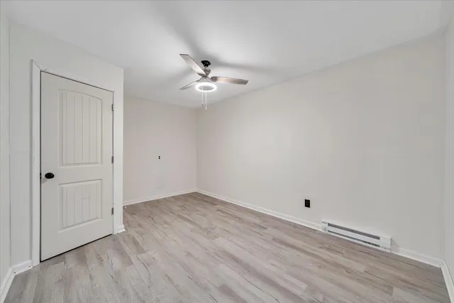 a view of a house with a back yard