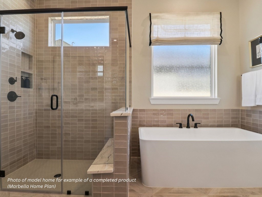 16847 Deep Wingbeat Way Magnolia, TX 77354 - Photo 7 of 16 a bathroom with a sink a mirror and shower