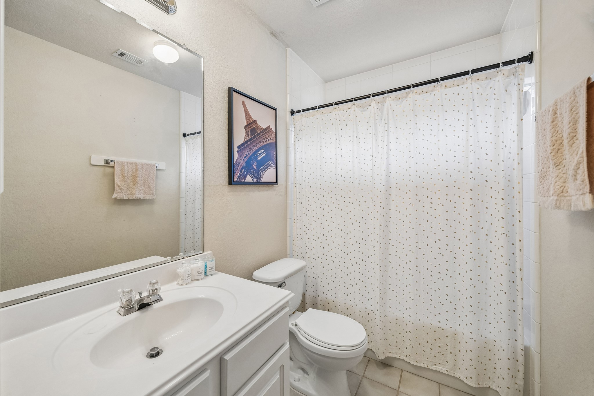 24027 Floragate Drive Spring, TX 77373 - Photo 19 of 21 a bathroom with a sink mirror and a toilet