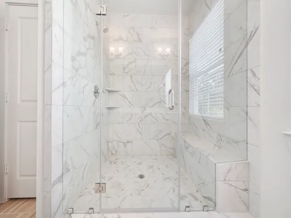 a bathroom with a sink a vanity and a mirror