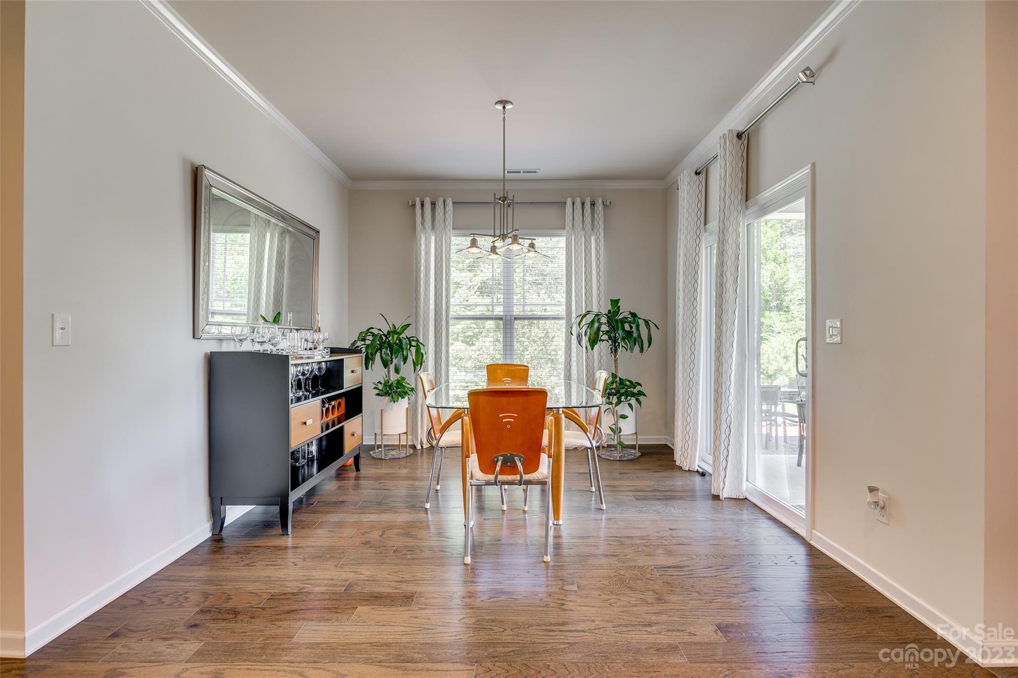 423 Harrier Crossing Circle Fort Mill, SC 29708 - Photo 17 of 36 a view of a livingroom with furniture window and wooden floor