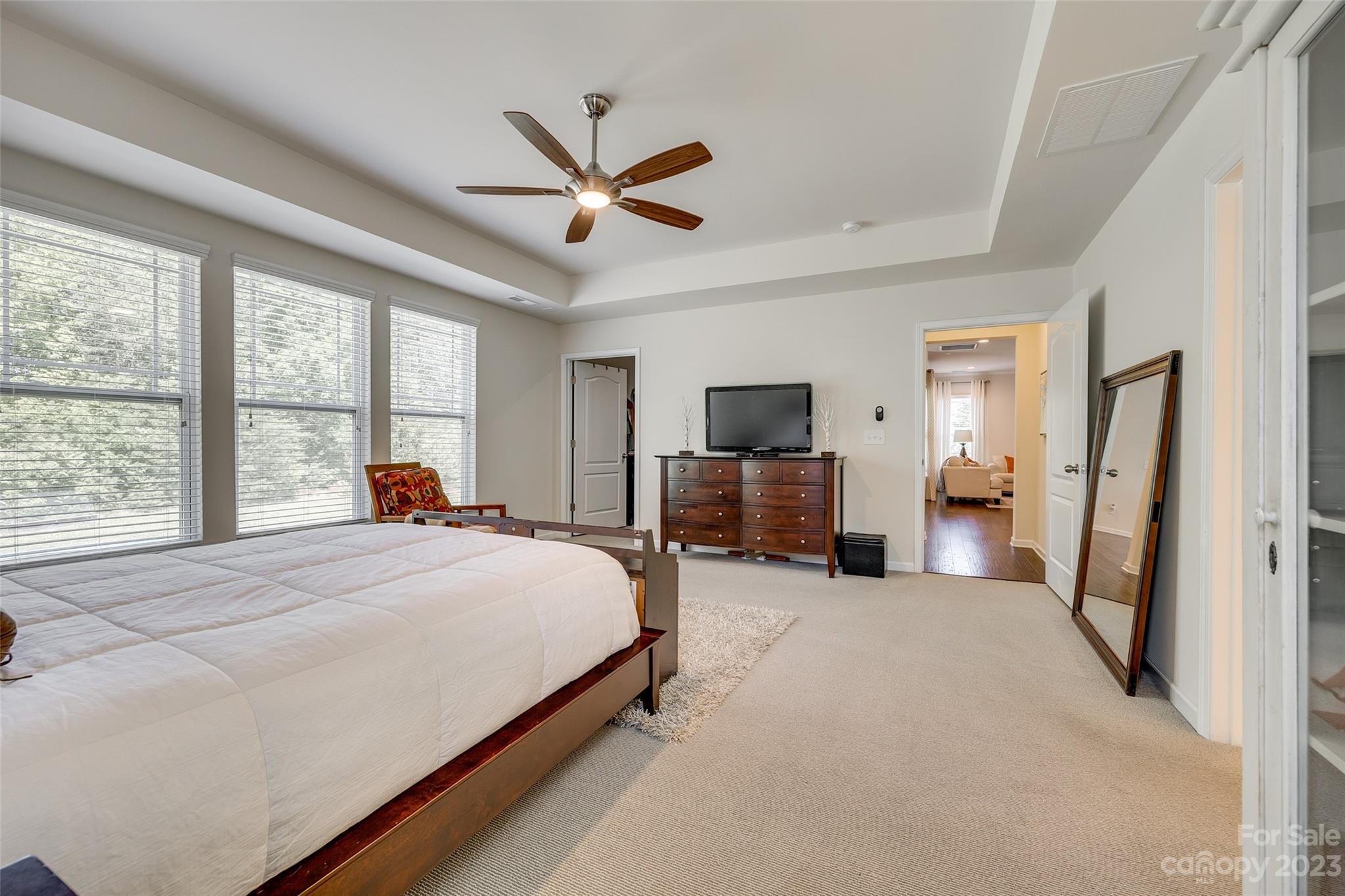 423 Harrier Crossing Circle Fort Mill, SC 29708 - Photo 20 of 36 a bed room with a bed and a tv