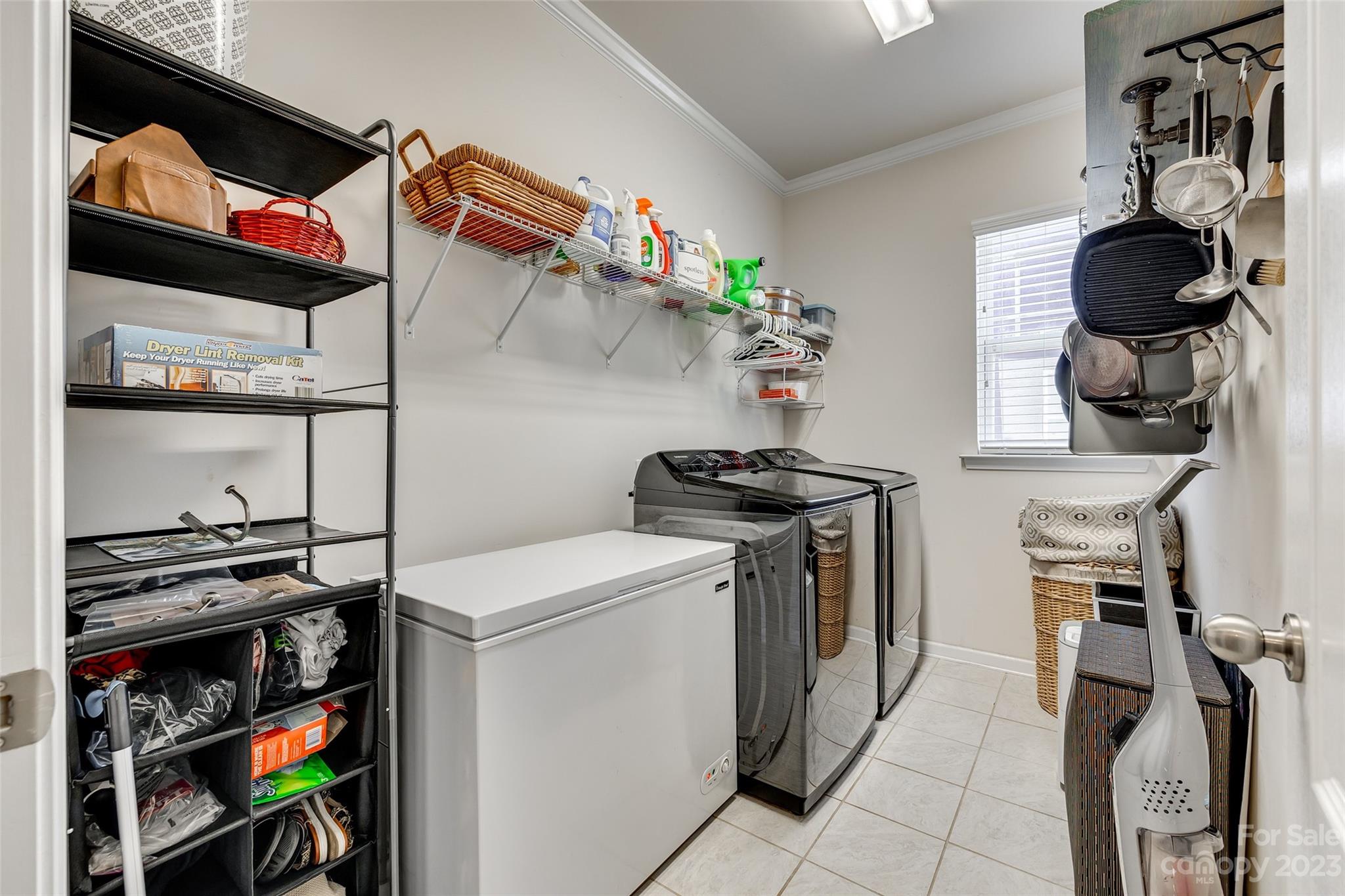 423 Harrier Crossing Circle Fort Mill, SC 29708 - Photo 24 of 36 a utility room with dryer and washer