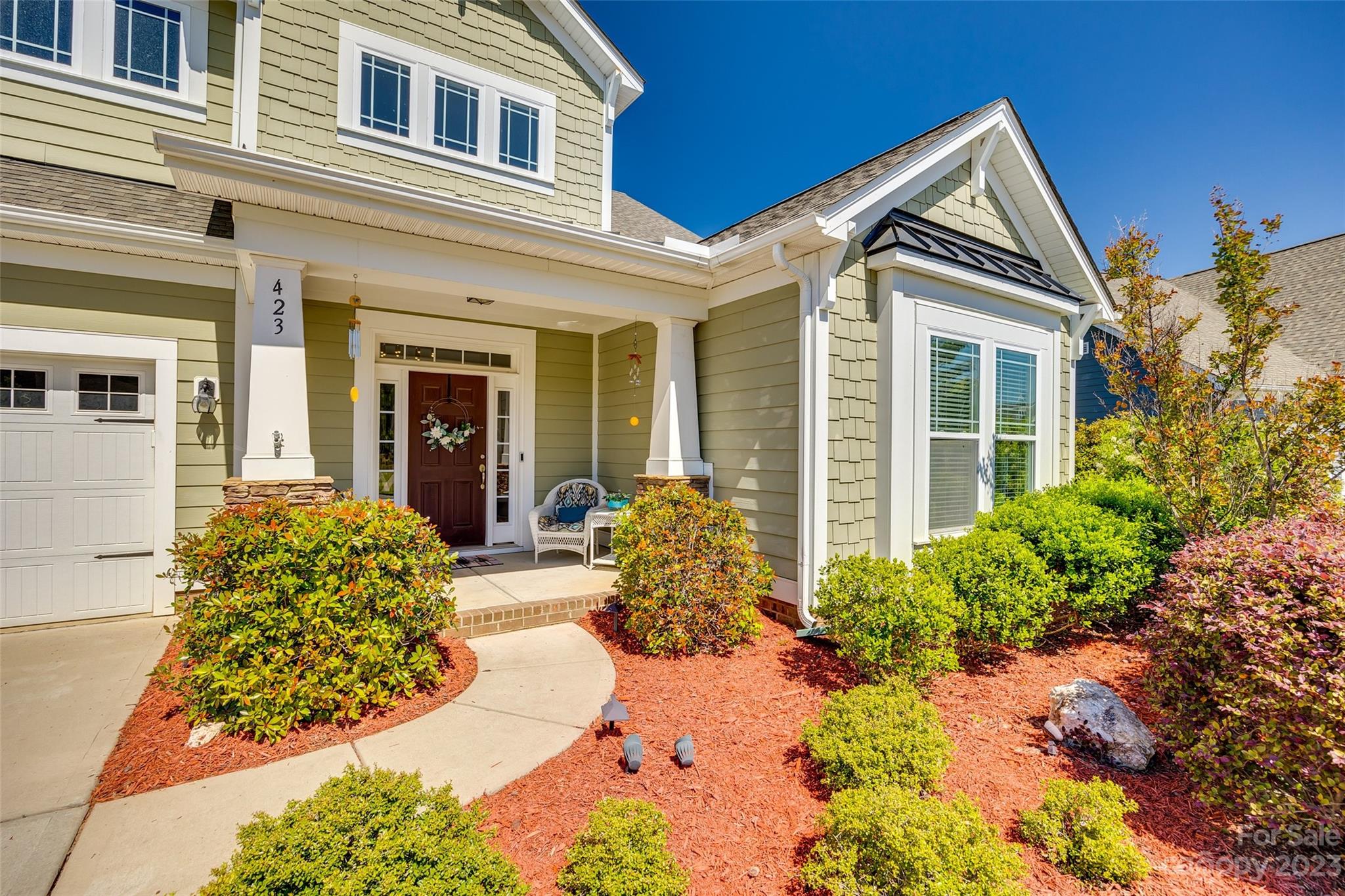 423 Harrier Crossing Circle Fort Mill, SC 29708 - Photo 3 of 36 front view of a house with a yard