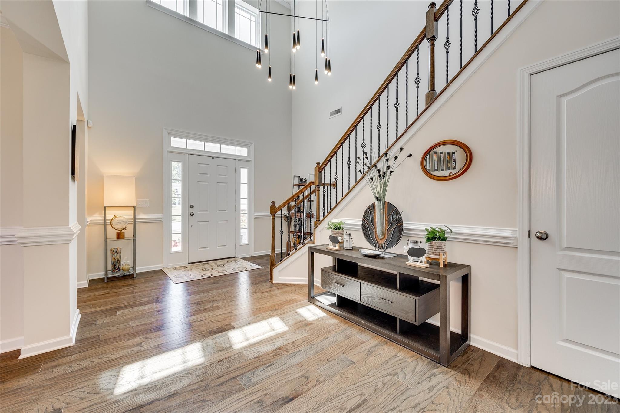 423 Harrier Crossing Circle Fort Mill, SC 29708 - Photo 5 of 36 a view of entryway with wooden floor