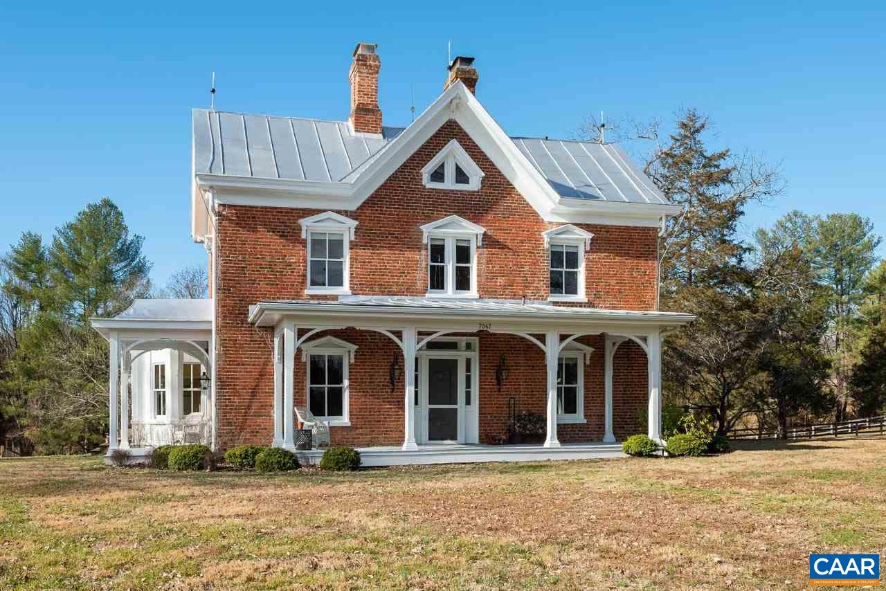 7047 Plank Road Charlottesville, VA 22903 - Photo 3 of 49 a front view of a house with a yard