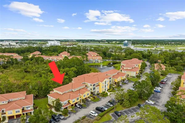 an aerial view of a houses with outdoor space
