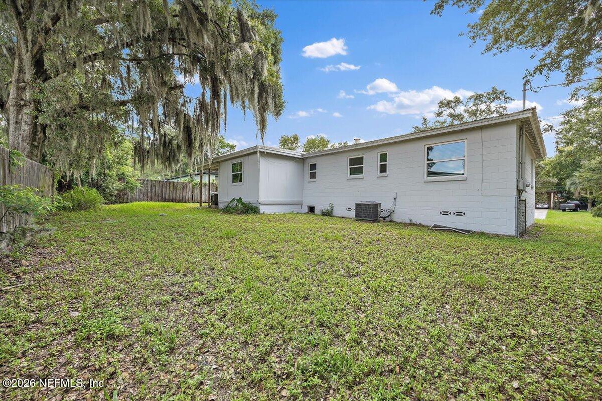 6923 Gaillardia Road South Jacksonville, FL 32211 - Photo 14 of 31 a view of a house with a yard