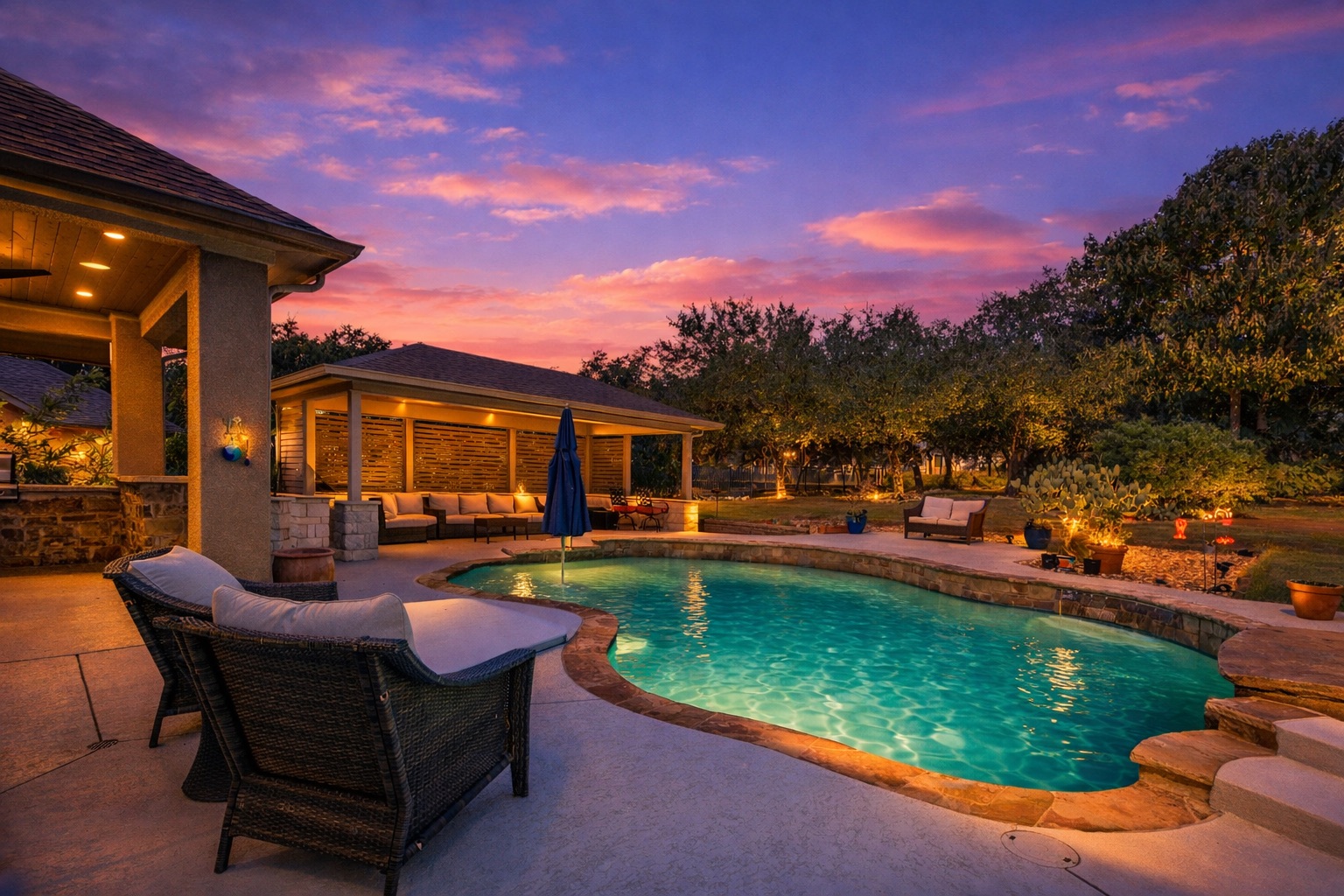 2300 Lakehurst Road Spicewood, TX 78669 - Photo 2 of 40 Pool at dusk with outdoor furniture, an outdoor pool, and a patio