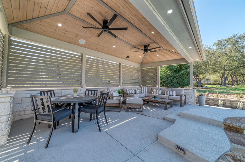 2300 Lakehurst Road Spicewood, TX 78669 - Photo 32 of 40 View of patio featuring a ceiling fan and outdoor lounge area